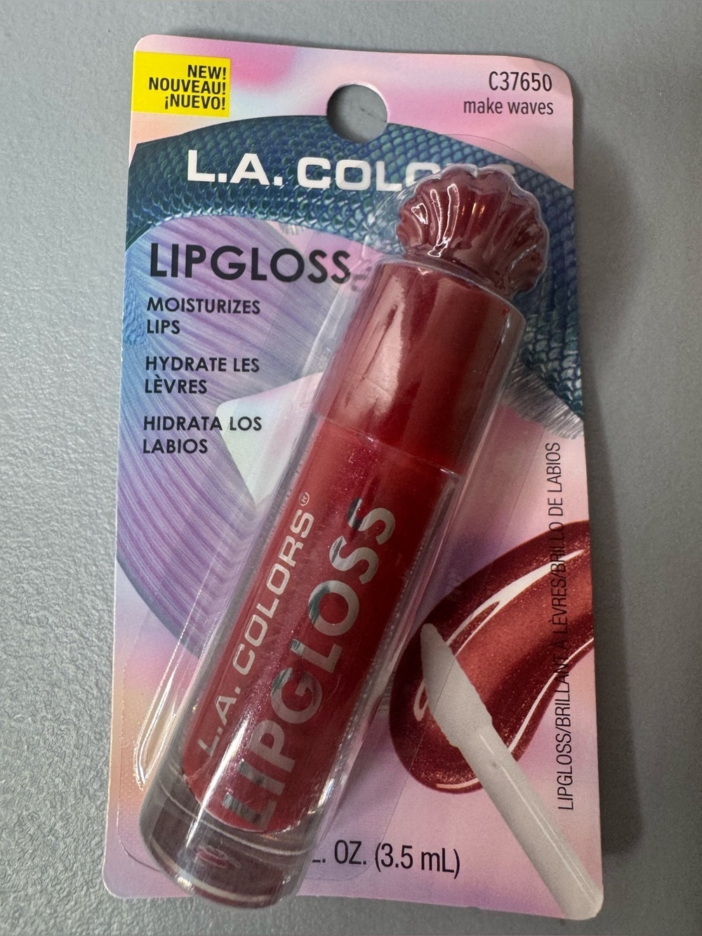 L.A. COLORS Lipgloss make waves Berry Red Shine seashell cape summer beach